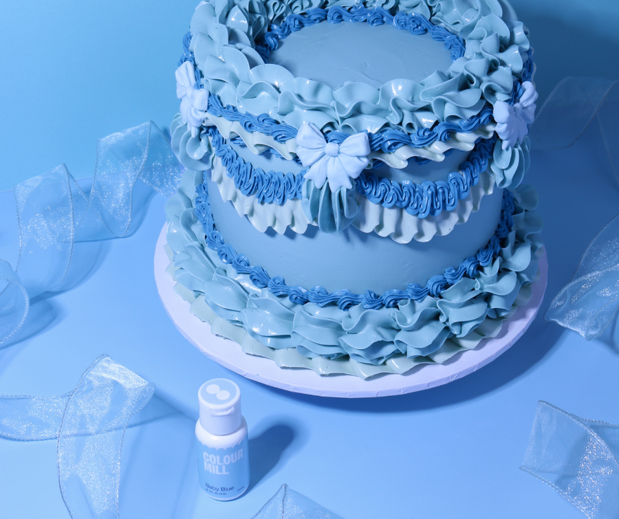 Monochrome lambeth cake decorated with Colour Mill Baby Blue oil-based food colouring