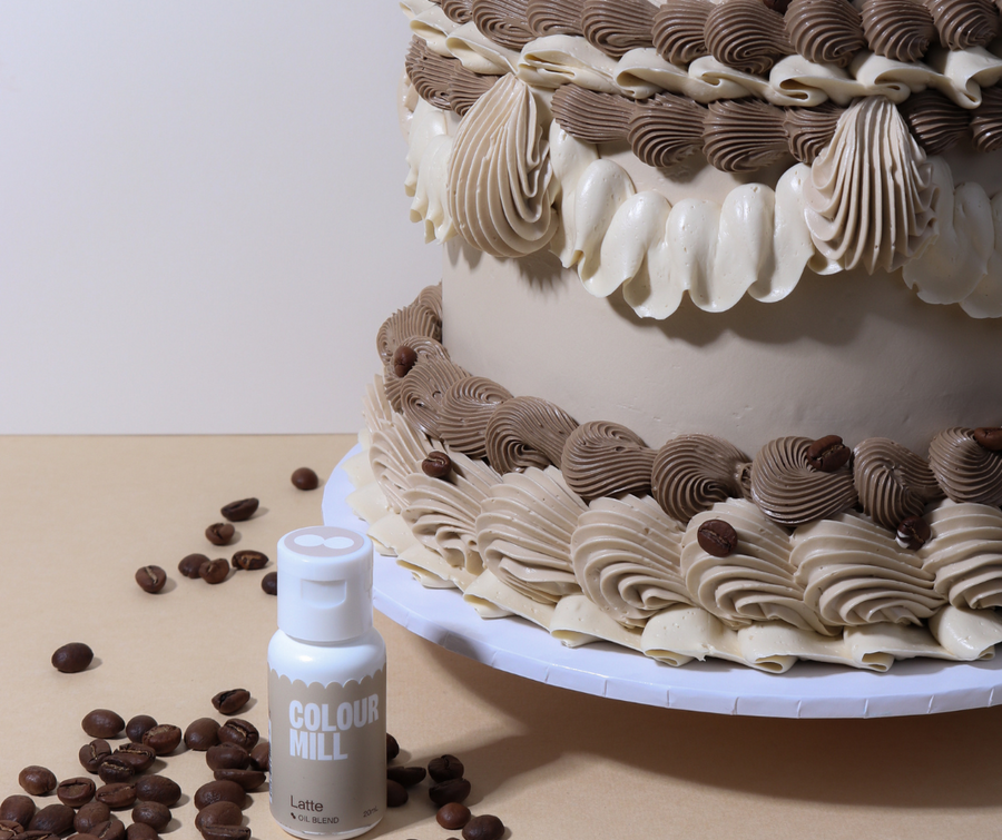 Monochrome lambeth cake decorated with Colour Mill Latte oil-based food colouring