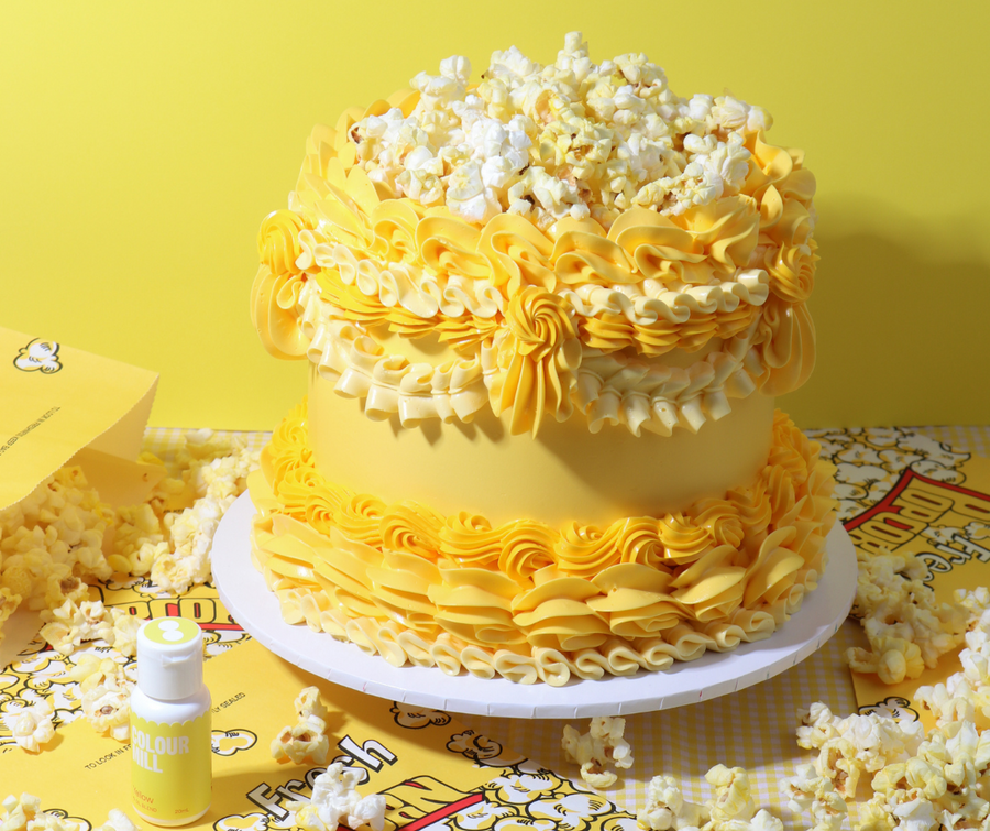 Monochrome lambeth cake decorated with Colour Mill Yellow oil-based food colouring